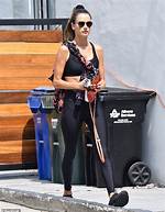 Alessandra Ambrosio, 39, Shows off Toned Abs in a Striped Bikini While Chilling with Her Kids