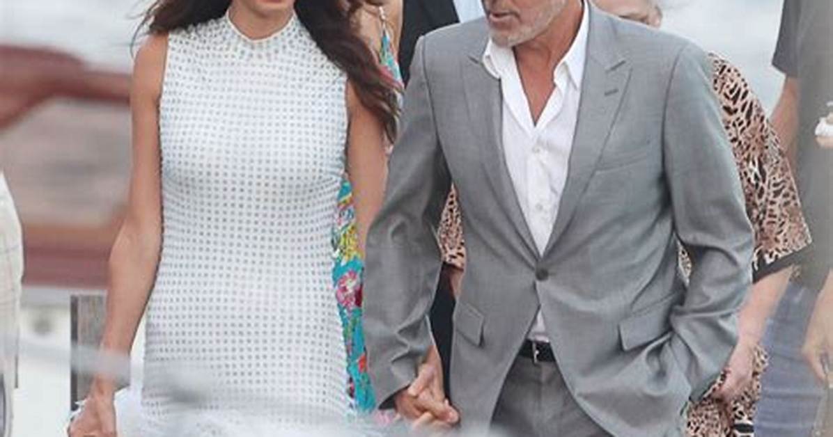 Amal Clooney Stuns in Ostrich Feather Dress Holding Hands with George in Lake Como: Photos
