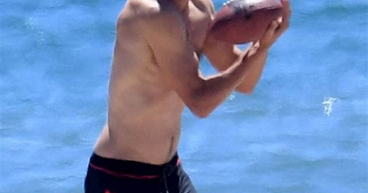 Ashton Kutcher Plays Football on the Beach Shirtless with Mila Kunis After Health Scare