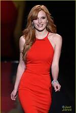 Bella Thorne Wears Red Latex Thong, Bra & Thigh-High Boots in Video – Hollywood Life