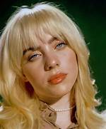 Billie Eilish’s Long Retro Blonde Locks Return in 1St Trailer for Her Concert Film ‘Happier Than Ever’