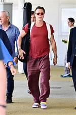 Brad Pitt Rocks Rainbow Sneakers, Carries Guitar in Venice: Photo – Hollywood Life