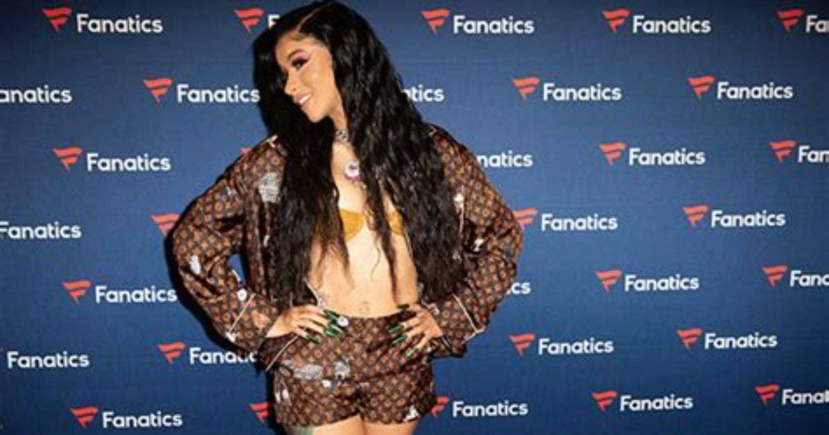 Cardi B Flaunts Cleavage in Skimpy Bra Top as She Rocks Neon Blue Wig – See Pic