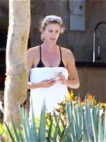 Charlize Theron Rocks Black Swimsuit in Greece on 46Th Birthday: Pics – Hollywood Life
