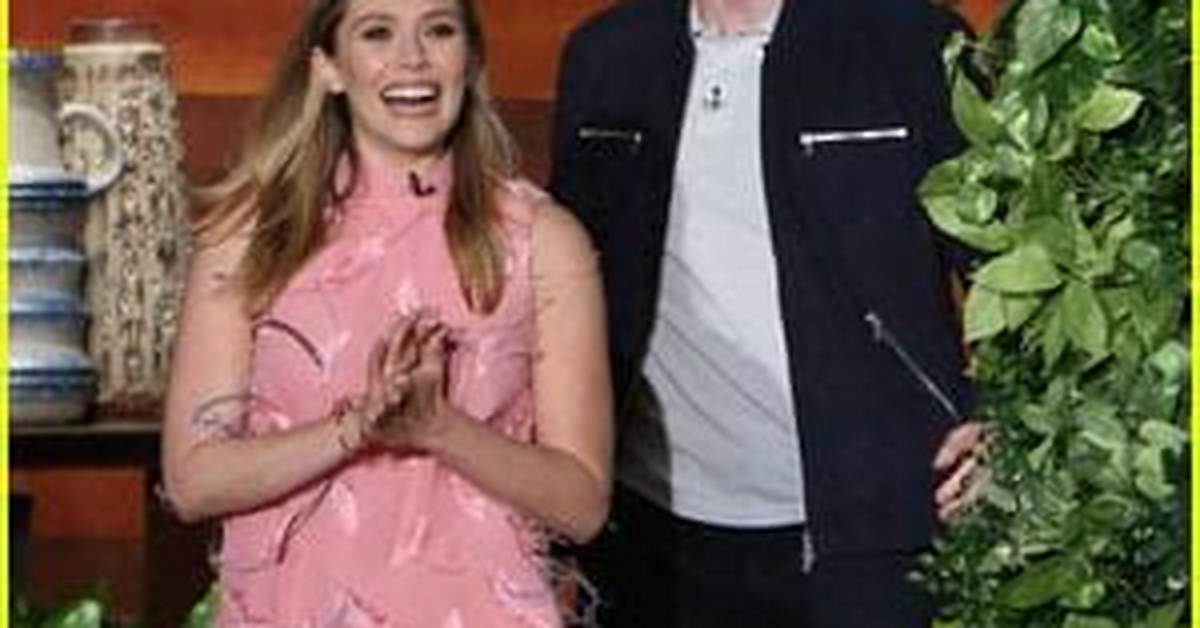 Chris Evans Stares at Elizabeth Olsen’ at ‘Captain America’ Event: Pic – Hollywood Life