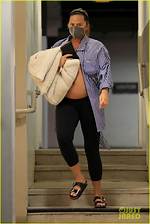 Chrissy Teigen Bares Baby Bump in Black Crop Top for Family Movie Date: Photo