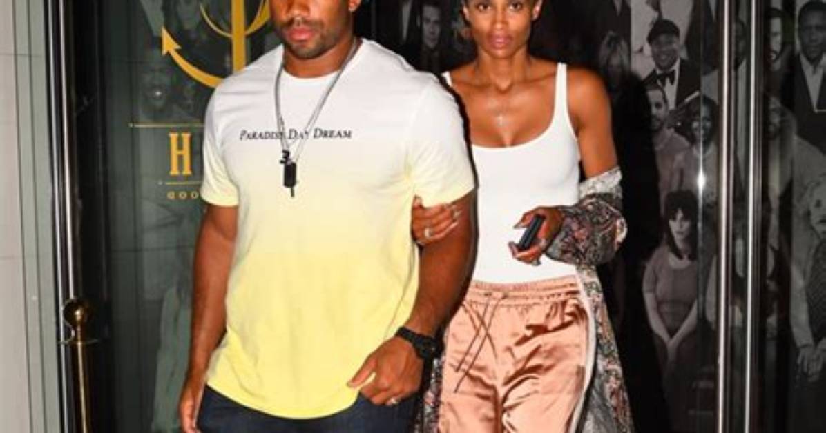 Ciara Stuns in Tight Tank Top & Sweetly Holds Russell Wilson’s Arm on Date – Pic