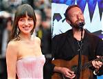 Dakota Johnson Reveals Why She & Chris Martin Keep Their Relationship out of the Public Eye
