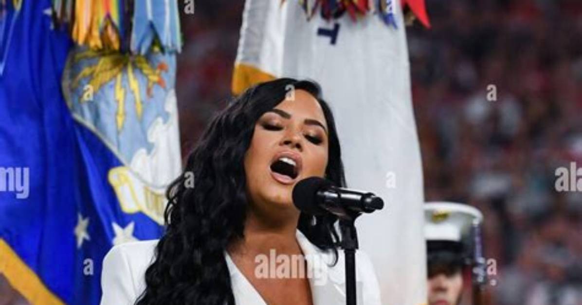 Demi Lovato Flawlessly Performs National Anthem Wearing Stylish, All-White Suit During Super Bowl