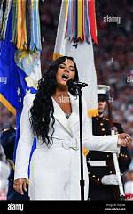 Demi Lovato Flawlessly Performs National Anthem Wearing Stylish, All-White Suit During Super Bowl