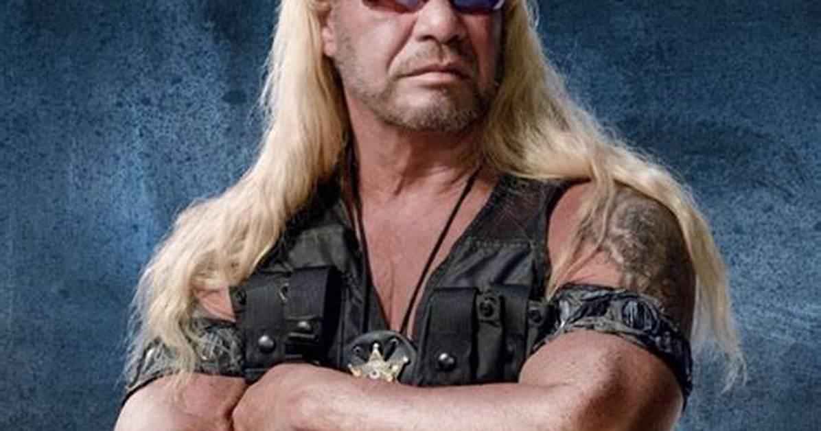 Dog the Bounty Hunter Holds up Newspaper to Prove He’s ‘Alive’ After Rumors He Had a 2Nd Pulmonary Embolism