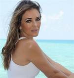 Elizabeth Hurley, 55, Poses in the Sand While Wearing Sexy White Bikini