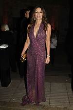 Elizabeth Hurley Looks Fierce in Plunging Gown to Her Waist for Birthday Party in London – Photos