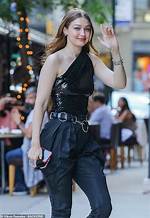 Gigi Hadid Channels ‘The Matrix’ in Black Outfit & Cat Eye Sunglasses 9 Mos. After Giving Birth