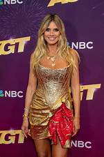 Heidi Klum Dances in a Gold Mini Dress for Flirty Video with Hubby Tom Kaulitz