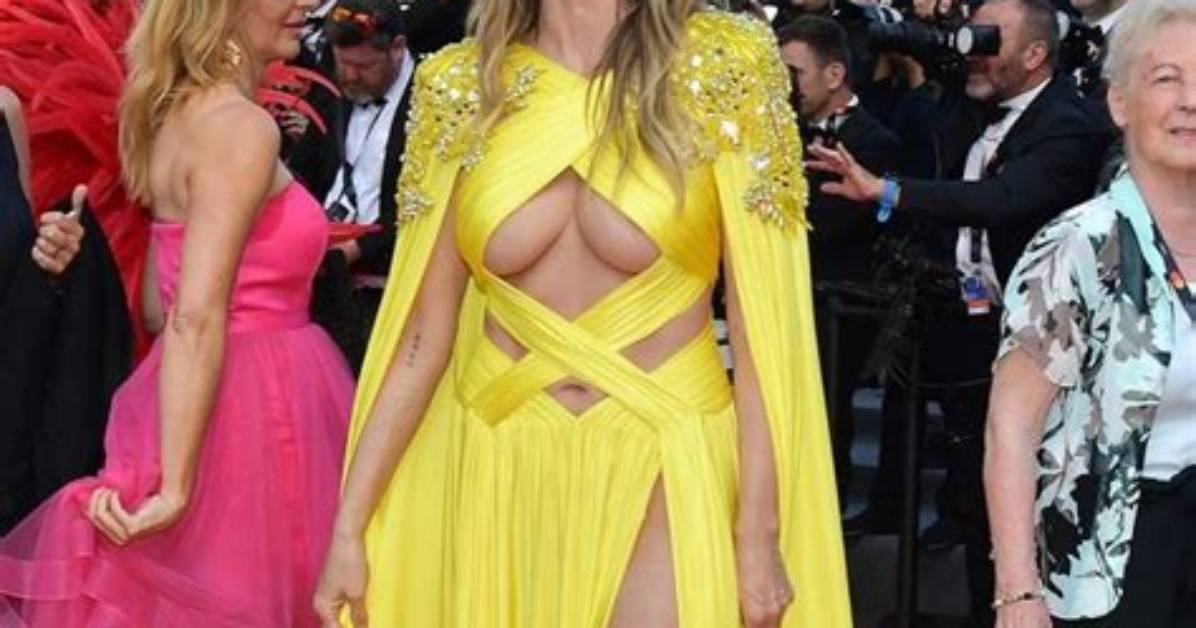 Heidi Klum Rocks Incredibly Sexy Yellow Dress with Cutouts up the Entire Side