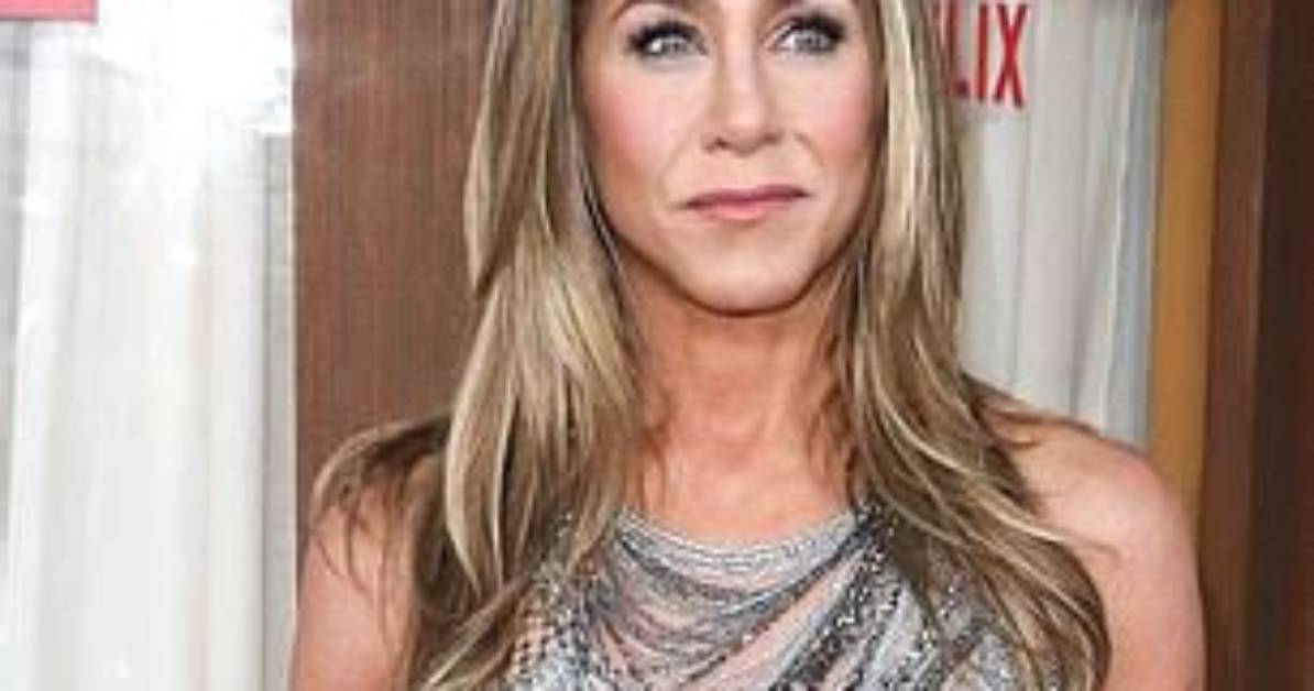 Jennifer Aniston Shows off Toned Legs in Pinstripe Midi Dress at Variety’s Power of Women Luncheon