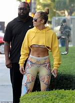 Jennifer Lopez, 49, Flashes Her Abs & Looks Effortlessly Cool in Jumbo Shades as She Heads to Gym