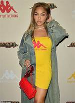 Jordyn Woods Shows off Her Massive Multicolored Sneaker Collection & Fans Are in Love with It