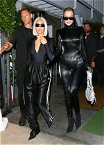 Khloe Kardashian Slays in Skintight Latex Jumpsuit After Tristan Holds Hands with Mystery Woman