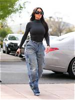 Kim Kardashian’s Black Top & Distressed Jeans: Love or Loathe?