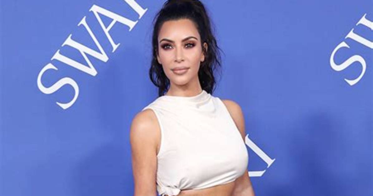 Kim Kardashian Slays White Crop Top, Ruffled Skirt & Thigh-High Stockings for Sexy Skims Shoot