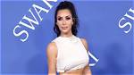 Kim Kardashian Slays White Crop Top, Ruffled Skirt & Thigh-High Stockings for Sexy Skims Shoot