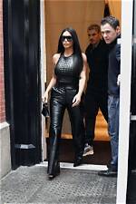 Kim Kardashian Wears Skintight Leather Chaps with Denim as Kanye West Pats Her Backside