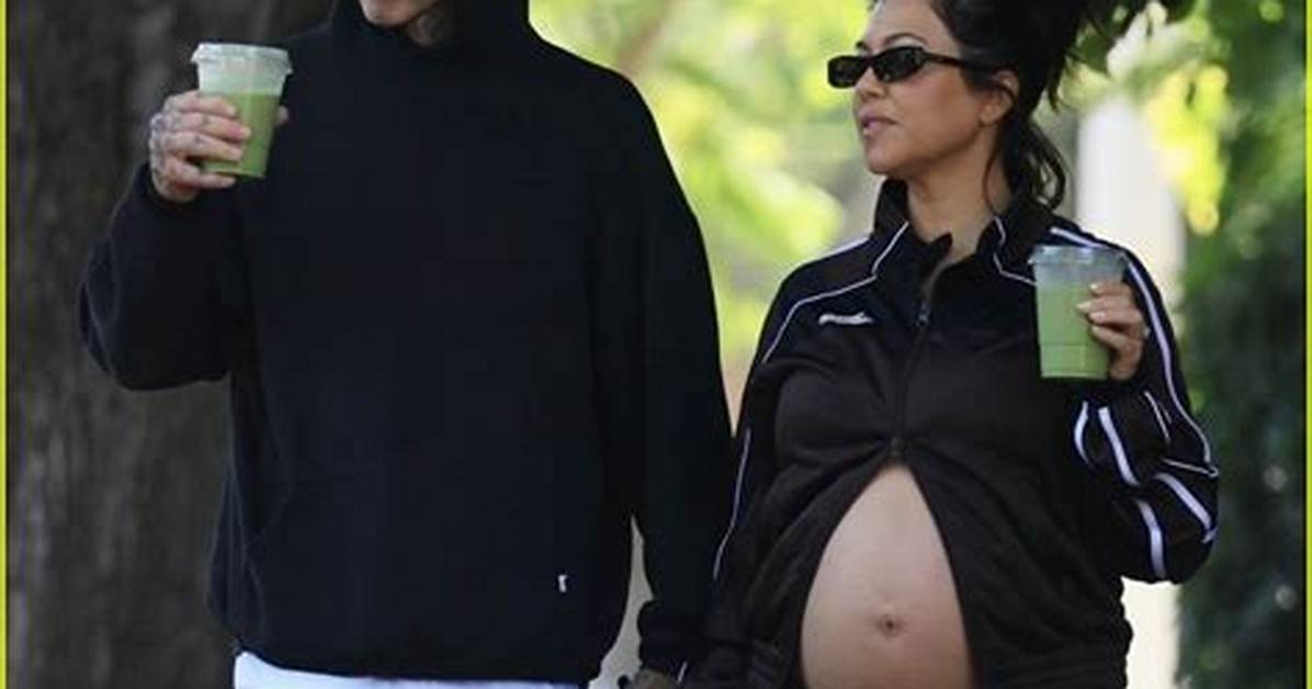 Kourtney Kardashian Shows off Her Bare Baby Bump While Floating in the Water During Beach Getaway