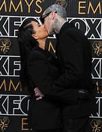 Kourtney Kardashian & Travis Barker Passionately Make out on the Emmys Carpet: Pda Photos