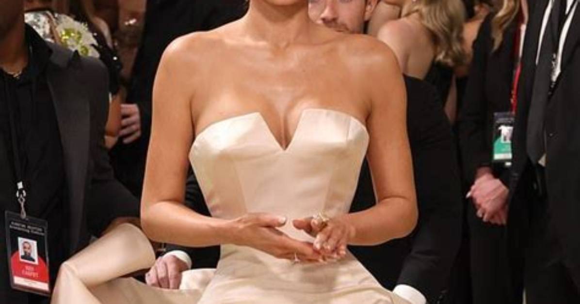 Kylie Jenner Poses in Stunning White Gown with Plunging Neckline After Reuniting with Drake