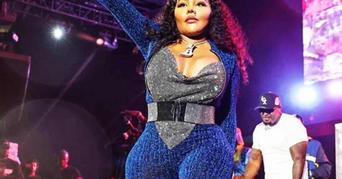 Lil Kim in Silver Jumpsuit in New Set of Photos – Hollywood Life