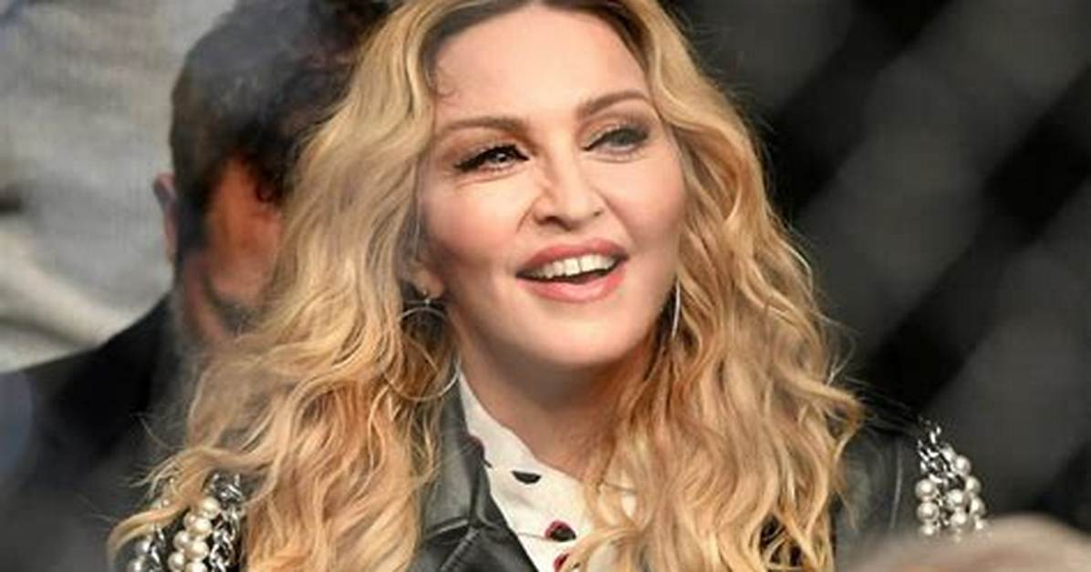Madonna, 62, Is Nearly Unrecognizable with Platinum Blonde Hair & a Green Robe in New Selfies