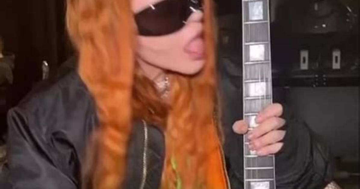 Madonna Licks Guitar While Rocking Fishnets in Sexy New Video – Hollywood Life