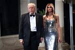 Melania Trump’s Chest Looks Huge in Tight Raincoat Amidst Speculation She Got a Boob Job