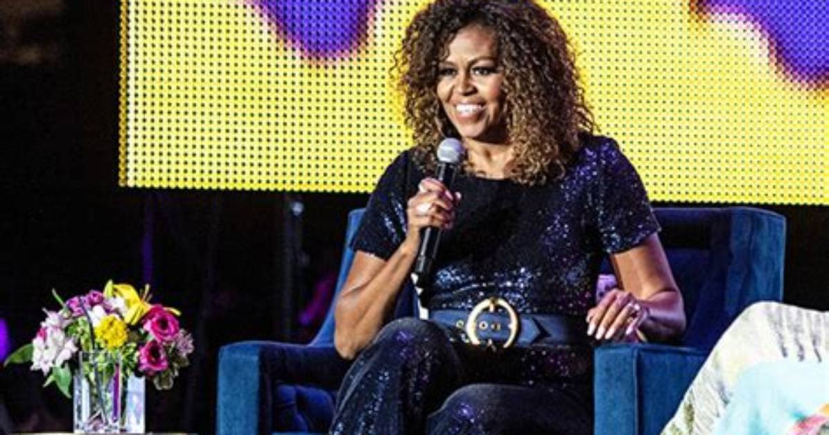 Michelle Obama Sparkles in Glittery Blue Jumpsuit at Essence Festival – Pics