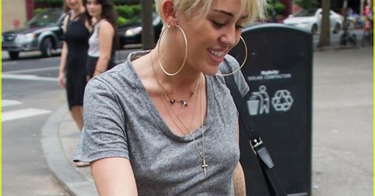 Miley Cyrus Rocks Backless Jumpsuit While Dancing in New Video – Hollywood Life