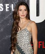 Millie Bobby Brown Sports Long Curly Hair at ‘Stranger Things’ Event – Hollywood Life