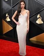 Olivia Rodrigo Sparkles in White Sequined Gown at the 2024 Grammys: Red Carpet Photos