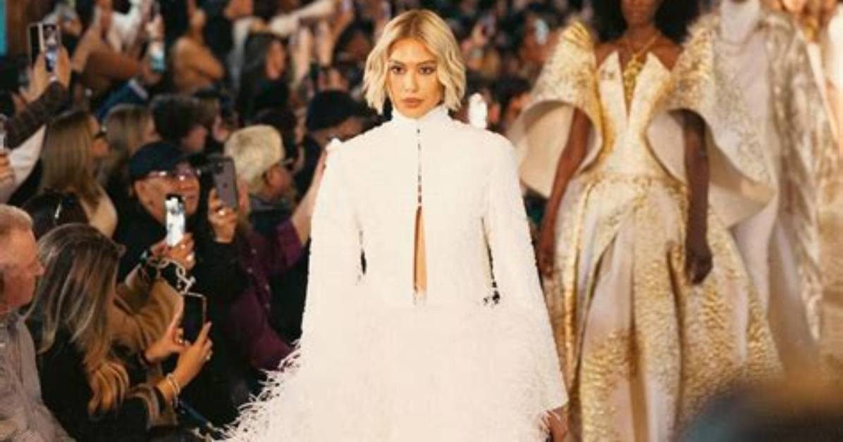 Reveals Abs at Paris Fashion Week – Pic – Hollywood Life