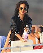 Rihanna Sizzles in a Black & White Bikini While Poolside Next to Her ‘Queen Sized’ $1,495 Book