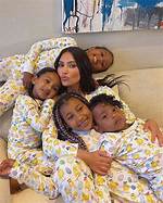 Saint West, 4, Giggles While Cuddling up to Brother Psalm, 1, in Adorable Video