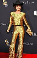 Shania Twain Looks Fabulous in a Metallic Gold Pantsuit & Cowboy Hat at Pre-Grammys Party
