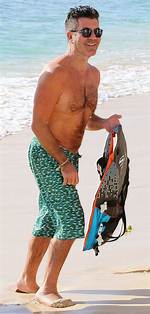 Simon Cowell, 60, Shows off 20 Lb. Weight Loss While Shirtless & Kissing Gf Lauren Silverman — Pics