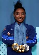 Simone Biles Proves She’s Just as Good at Axe-Throwing as She Is at Gymnastics with Perfect Bullseye