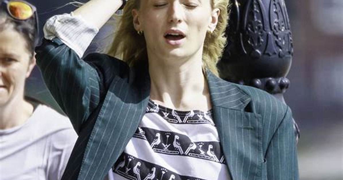 Sophie Turner Looks Cool & Casual in Biker Shorts & Relaxed Shirt While out in Nyc