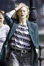 Sophie Turner Looks Cool & Casual in Biker Shorts & Relaxed Shirt While out in Nyc