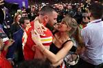 Taylor Swift & Travis Kelce Kiss While Dancing to ‘Love Story’ at Super Bowl After-Party: Watch