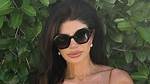 Teresa Giudice, 48, Rocks Sexy Plunging Mini Dress While Cozying up to Bf Louie Ruelas on Nye
