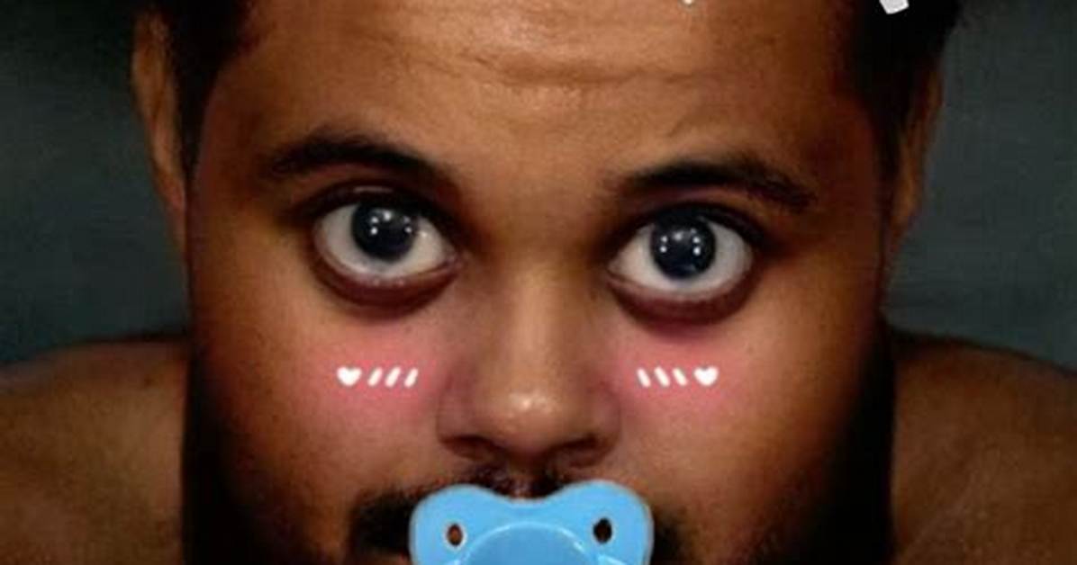 The Weeknd Shares Cute Baby Photo of Himself with a Santa Hat on & It’s So Adorable